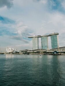Stunning view of Marina Bay Sands with clear sky and water reflection in Singapore.