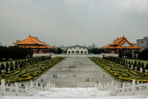 A scenic view of Chiang Kai-shek Memorial Square, showcasing traditional Asian architecture and gardens.